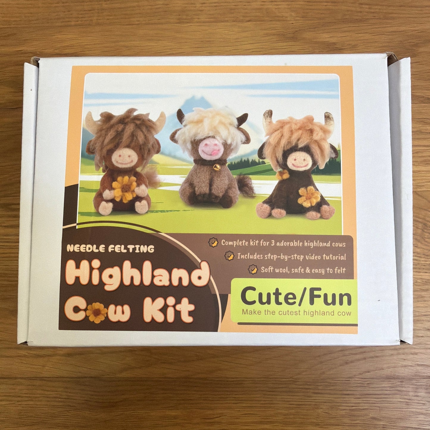 A felting needle set + instructions to create 3 cute highland cows.