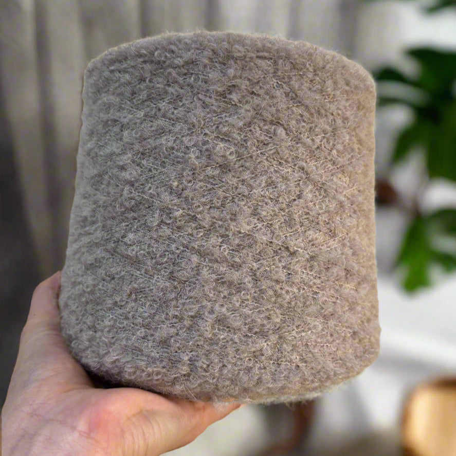 One cone, endless possibilities. 1 kg of natural softness and quality in superfine alpaca bouclé yarn.