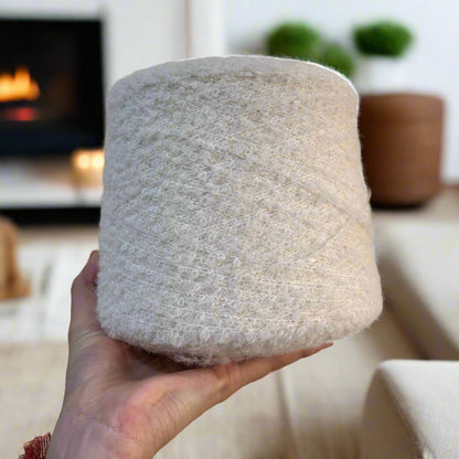 Softness in your hands: superfine alpaca bouclé in its purest form.