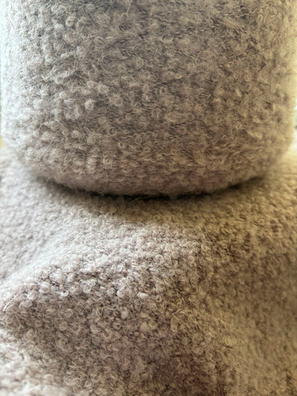 This is what softness looks like. Alpaca bouclé with a rustic yet elegant touch.